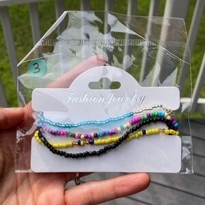 Set of 4 Stretchy anklets.  NWT.. handmade.